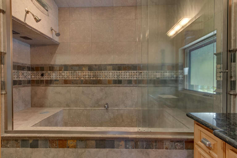 Bathroom with full bath and shower combo