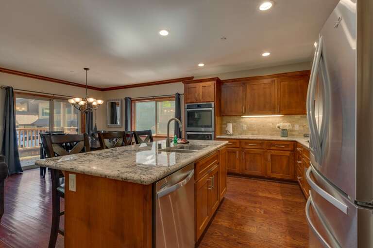 Kitchen with stainless-steel appliances, and spacious island