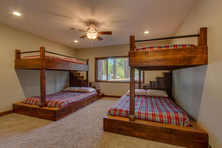 Bedroom with dual Single over Queen bunk beds Bedroom with dual Single over Queen bunk beds