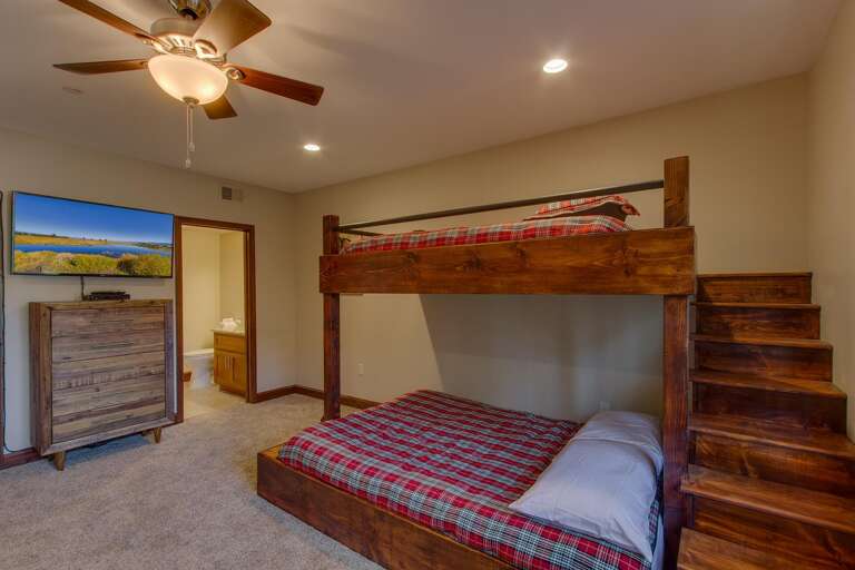 Bedroom with dual Single over Queen bunk beds Bedroom with dual Single over Queen bunk beds
