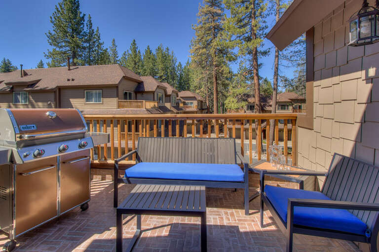 Patio with outside furniture and grill Patio with outside furniture and grill