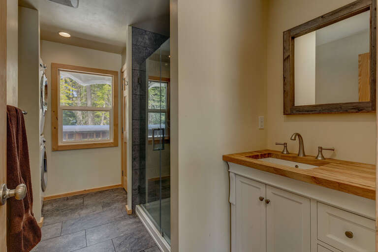 Bathroom with glass enclosed shower