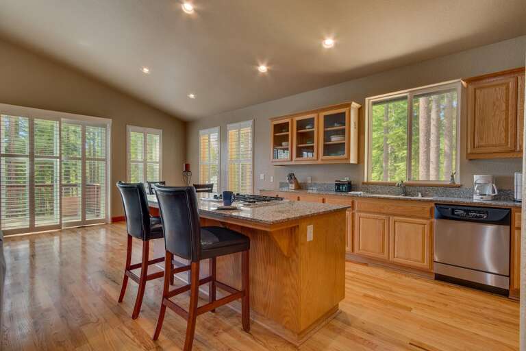Kitchen area with stainless-steel appliances and spacious island