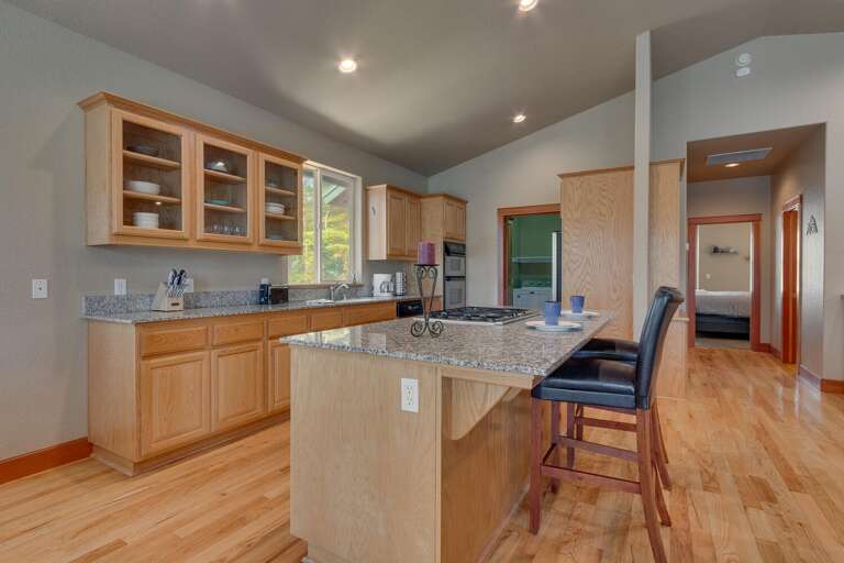Kitchen area with stainless-steel appliances and spacious island