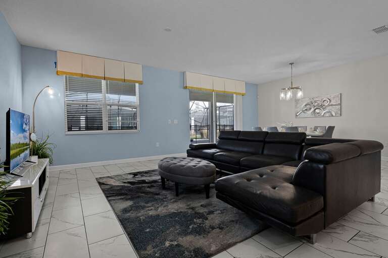 Living area with contemporary furniture and flat screen tv Living area with contemporary furniture and flat screen tv