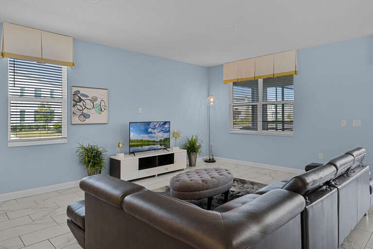 Living area with contemporary furniture and flat screen tv Living area with contemporary furniture and flat screen tv