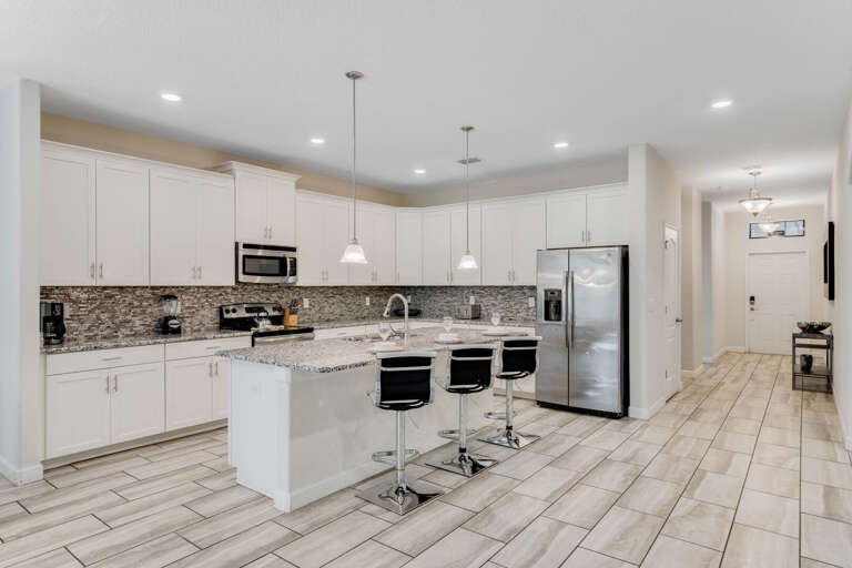 Kitchen area with stainless-steel appliance