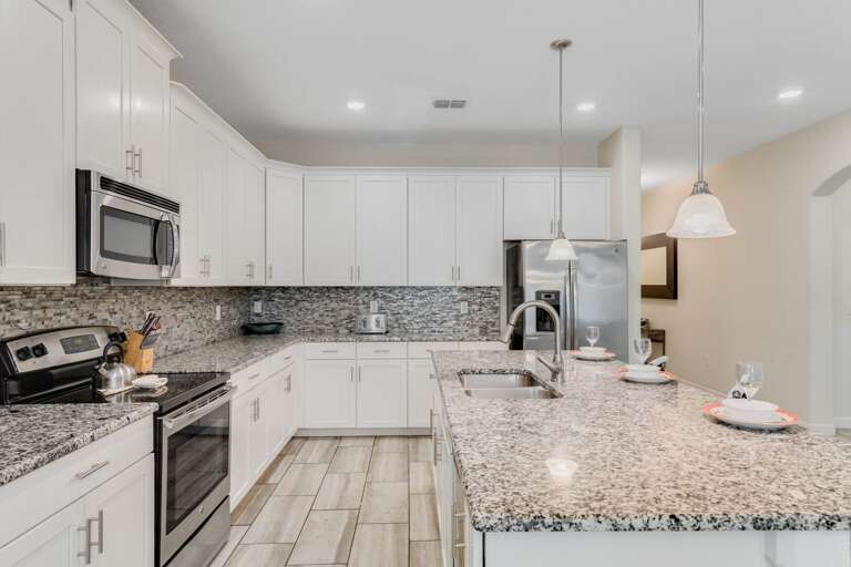 Kitchen area with stainless steel appliance