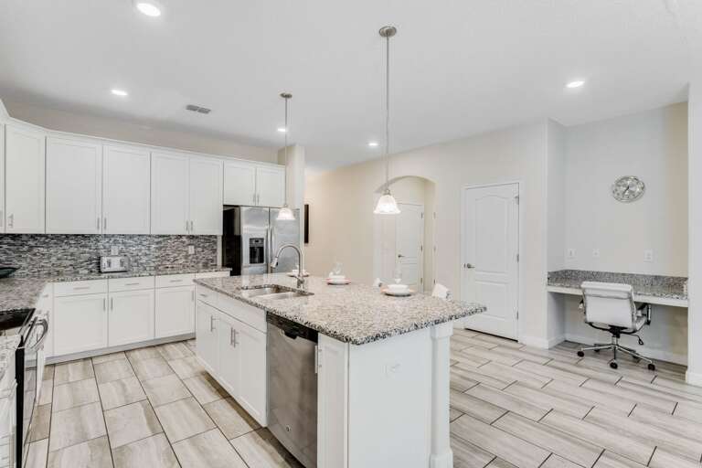 Kitchen area with stainless steel appliance