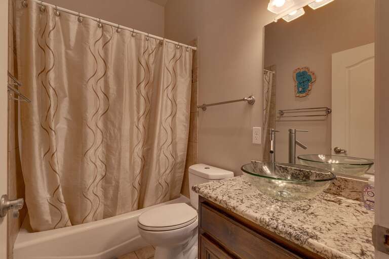 Bathroom with full bath/ shower combo