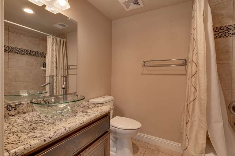 Bathroom with full bath/ shower combo