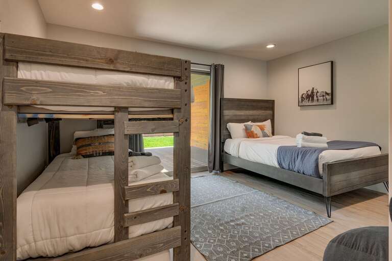 Bedroom with Single over Single bunk + Single beds Bedroom with Single over Single bunk + Single beds