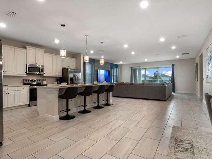 Kitchen, living, and dining area Kitchen, living, and dining area