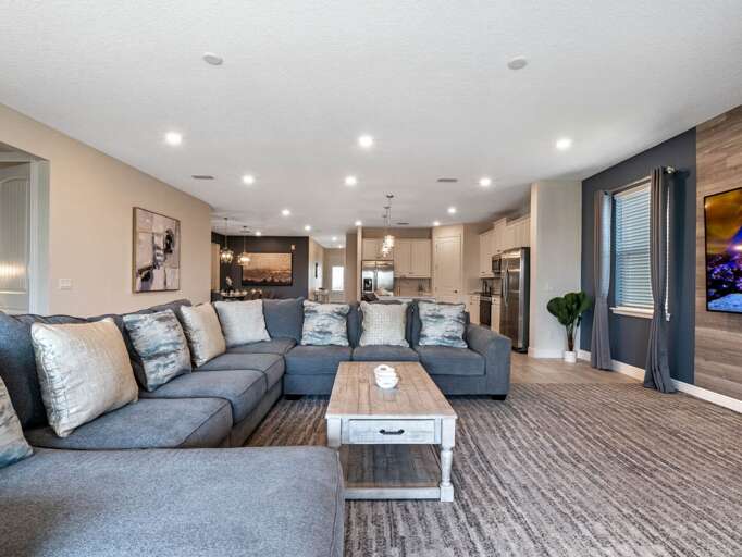 Living area with comfy sectional sofa and flat screen TV Living area with comfy sectional sofa and flat screen TV