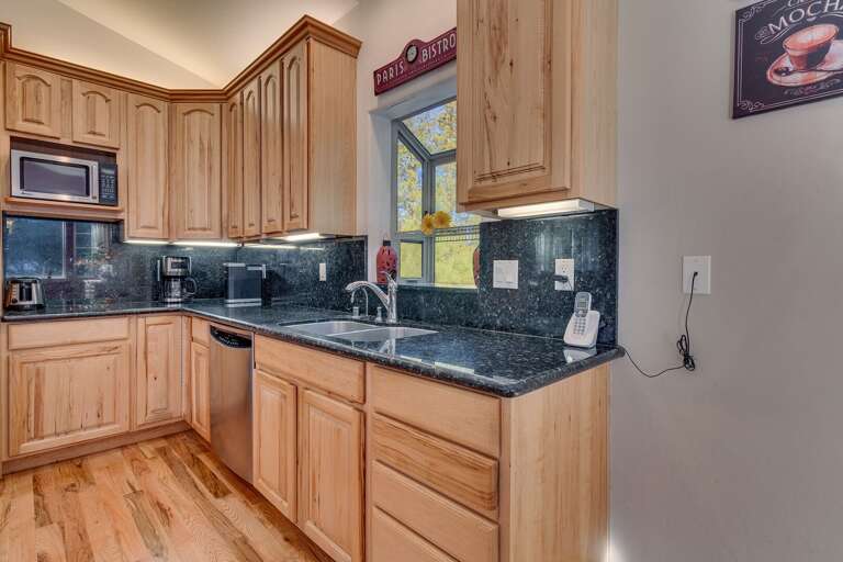 Kitchen area with stainless-steel appliances