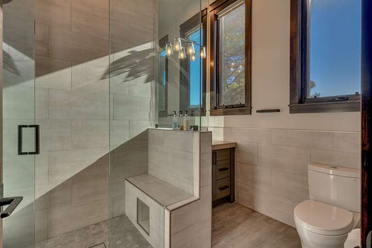 Bathroom with glass enclosed shower