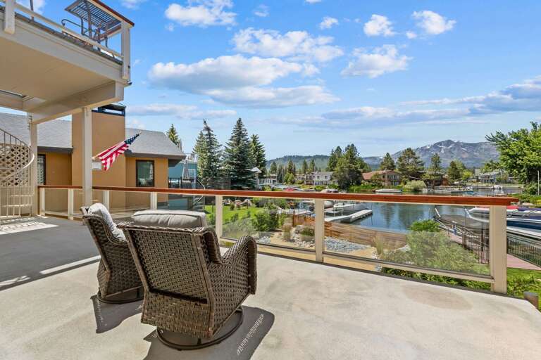 Upper floor patio with lounge chairs Upper floor patio with lounge chairs