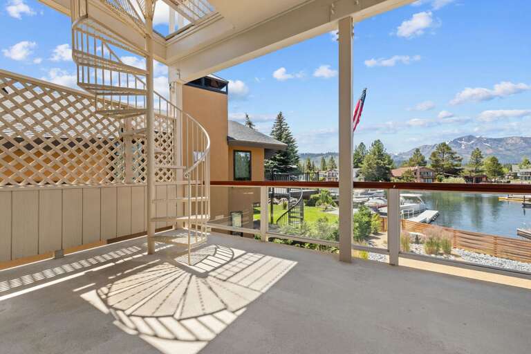 Upper floor patio and stairs leading to the roof top Upper floor patio and stairs leading to the roof top