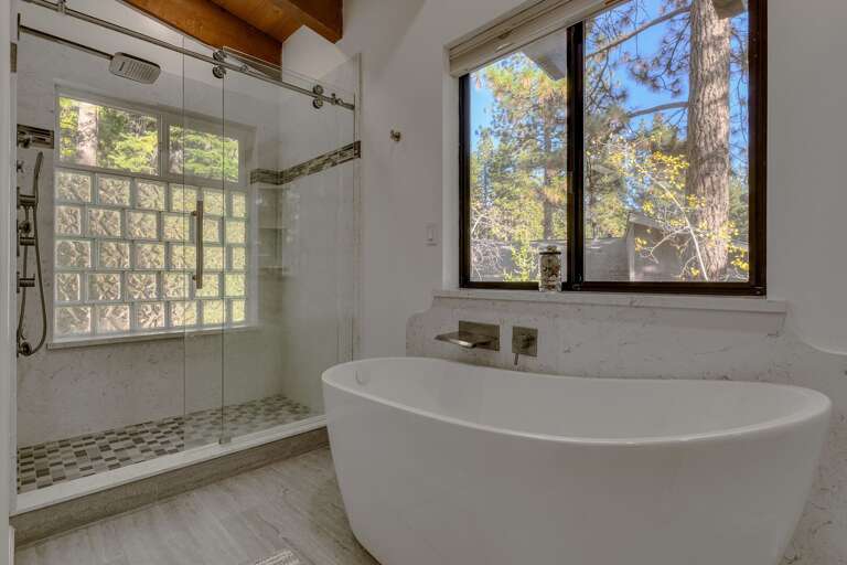 Bathroom with tub and shower