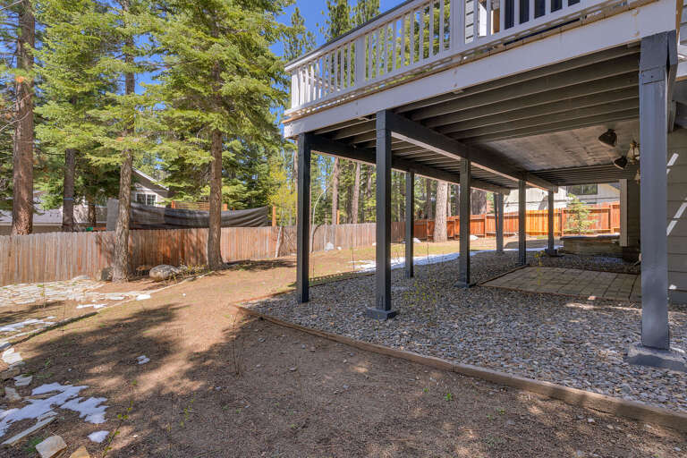 - Spacious backyard with room to relax and unwind
- Covered lower patio area beneath expansive decks
- Quiet Tahoe retreat tucked among the trees
