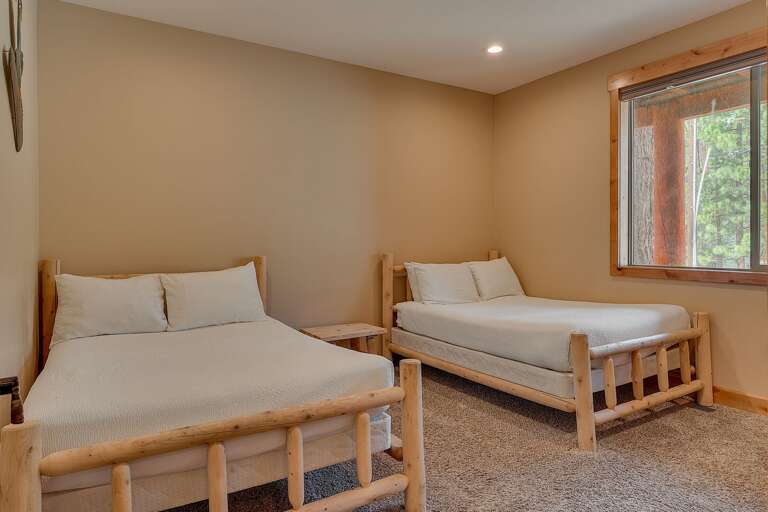 Bedroom with dual Full beds
