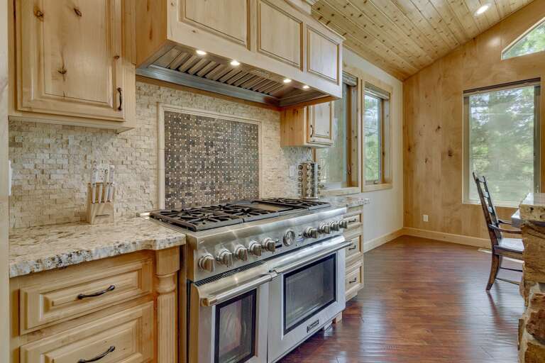 Kitchen area w/ stainless steel appliance