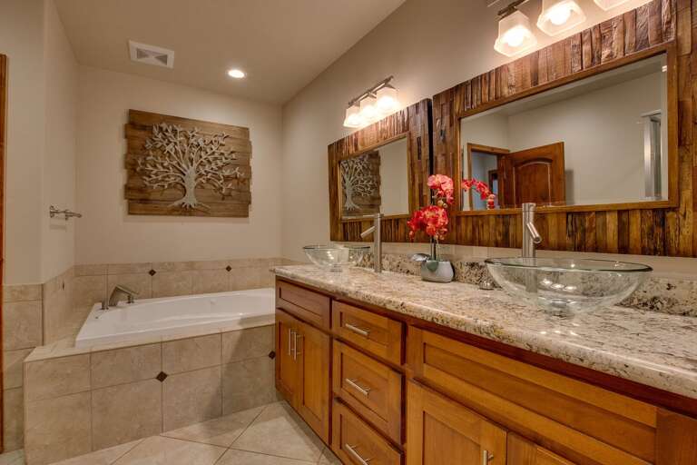 Bathroom w/ Dual Sinks and Jetted Tub