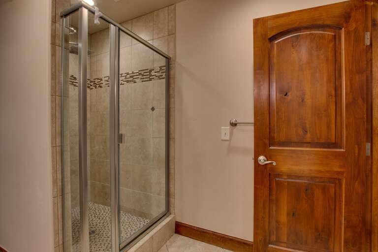 Bathroom w/ Glass Enclosed Shower
