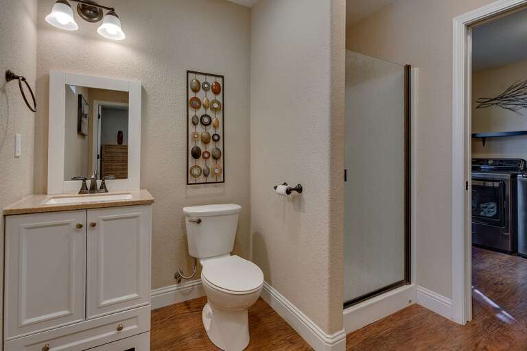 Bathroom with glass enclosed shower