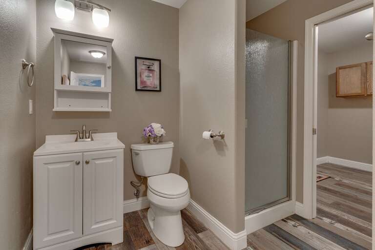 Bathroom with glass enclosed shower