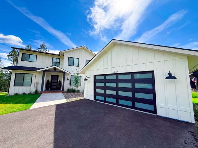 Suburban Structure Showcasing Spacious Split, Sleek Siding, Paired Pathways
