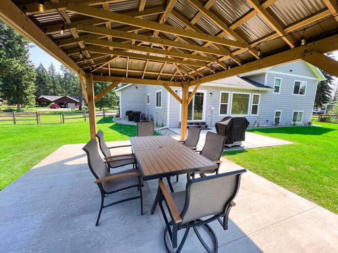 Verdant View Under Vast Veranda With Vacation Rental Visible