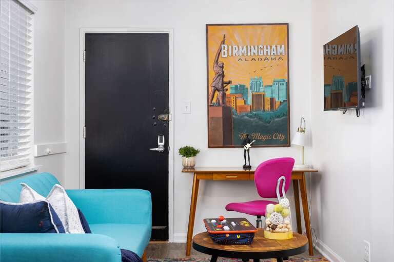 Watch TV or enjoy the view on our cozy couch Watch TV or enjoy the view on our cozy couch