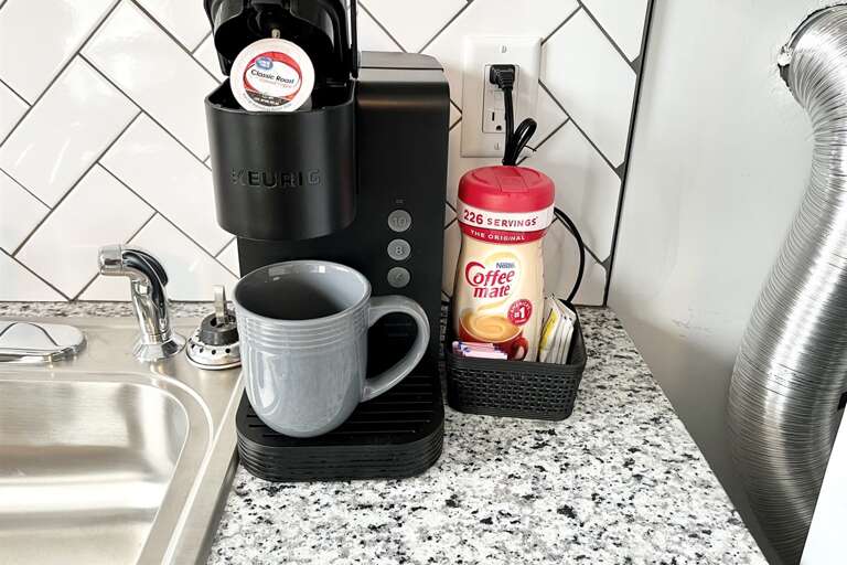 Coffee Machine, pods, and creamer