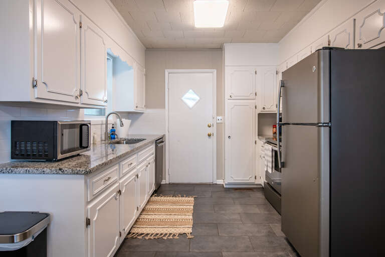 The back door from the kitchen leads into the garden