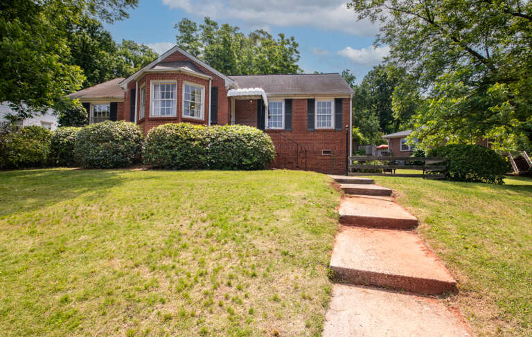 Please note that there are some steps leading to the front door