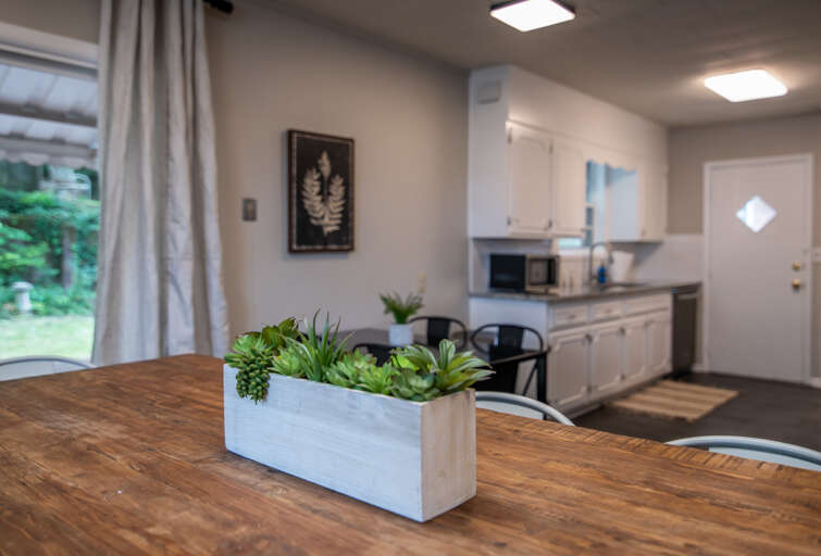 Open concept space with the dining room and kitchen all in one large room