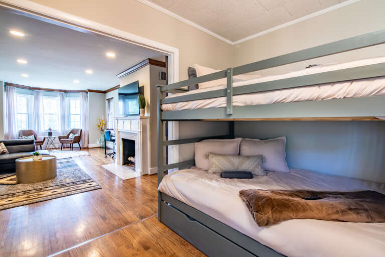 Large open floor plan, open the barn doors to keep an eye on the kiddos or close the doors for designated play space.