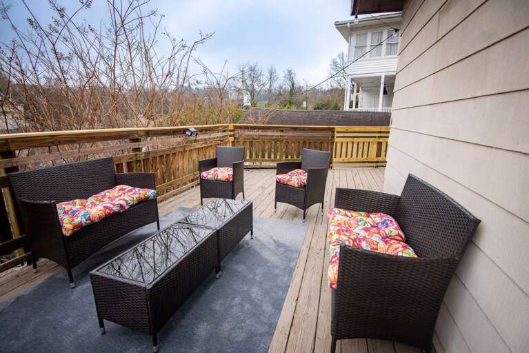 [Back deck] Enjoy your drink of choice with gorgeous views and lots of seating