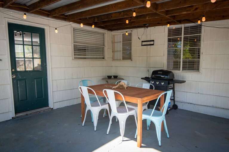 Outdoor living space with grill