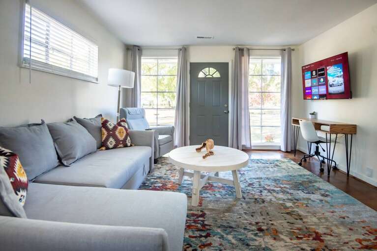 Large comfortable couch. Plenty of seating for your whole crew.