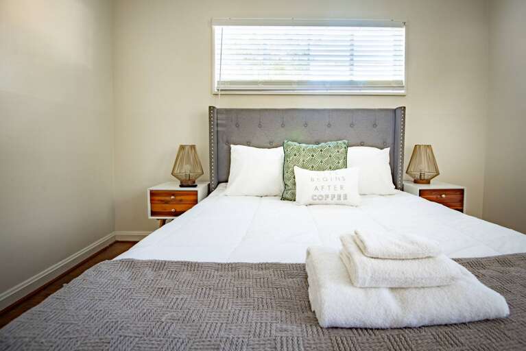 Cozy master bedroom equipped with Roku TV