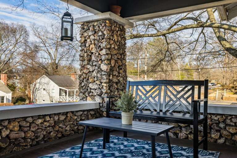 Front porch with bench and coffee table, ready for you to sit back and start off your day with some vitamin D Front porch with bench and coffee table, ready for you to sit back and start off your day with some vitamin D