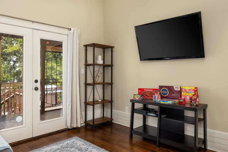 The ultimate entertainment hub, complete with an array of board games, a TV, and a PS4 console for gaming enthusiasts to enjoy hours of entertainment and excitement.