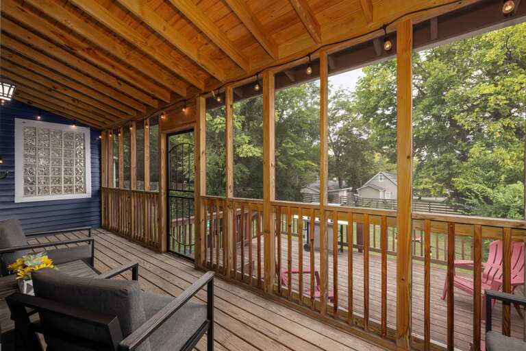 Enjoy the outdoors bug-free and in comfort on the screened-in porch, where you can relax, dine, or simply soak in the natural surroundings while staying protected.