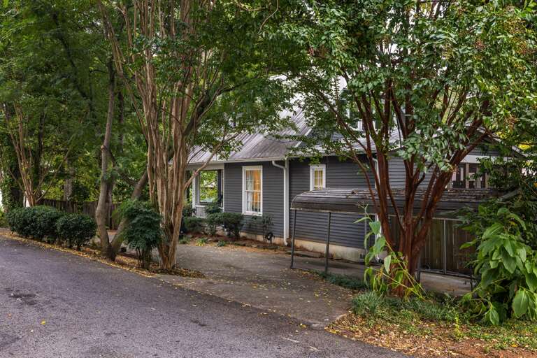 Convenient carport and driveway parking – hassle-free and protected for your vehicle. (room for 3-4 small cars) Convenient carport and driveway parking – hassle-free and protected for your vehicle. (room for 3-4 small cars)