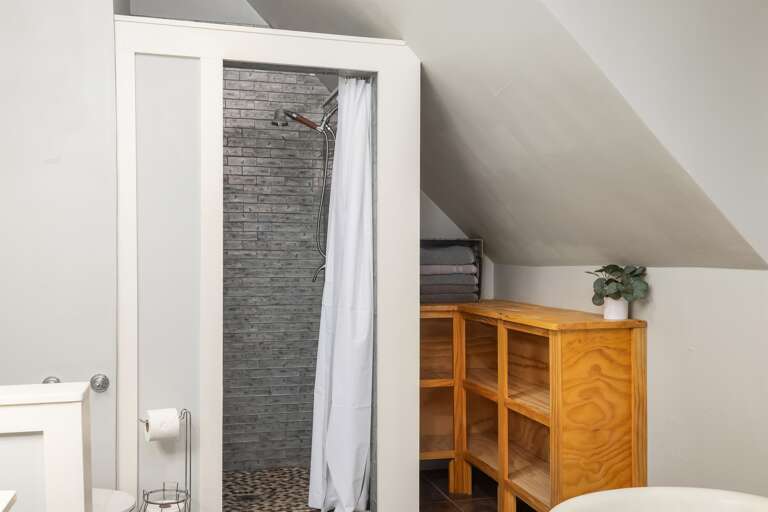 Step into a spacious walk-in shower for a refreshing and convenient bathing experience. Step into a spacious walk-in shower for a refreshing and convenient bathing experience.