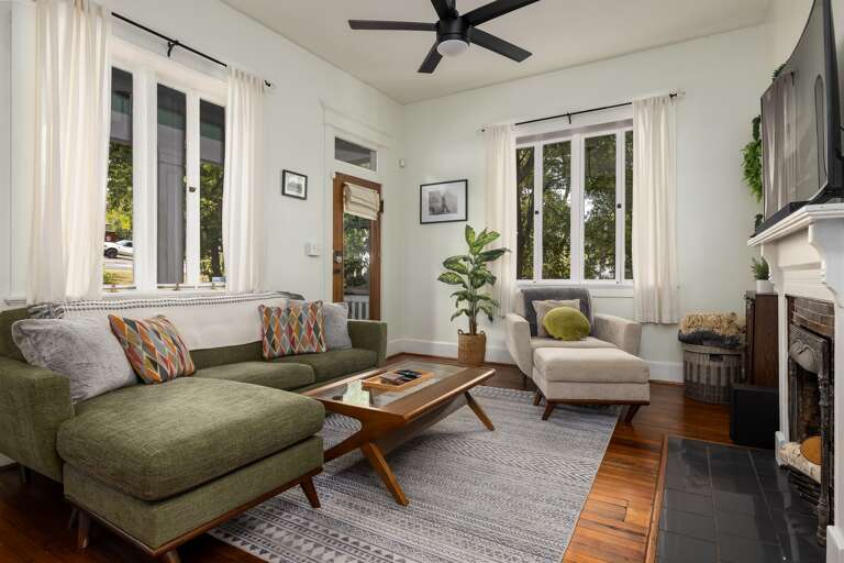 Relax on our comfy green sectional with an extra lounge seat for the ultimate in comfort and style. Relax on our comfy green sectional with an extra lounge seat for the ultimate in comfort and style.