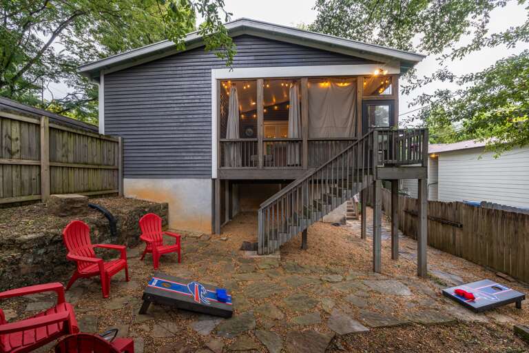 Step into our gorgeous fenced backyard, seamlessly connected to the kitchen and screened-in porch for a perfect indoor-outdoor experience. Step into our gorgeous fenced backyard, seamlessly connected to the kitchen and screened-in porch for a perfect indoor-outdoor experience.