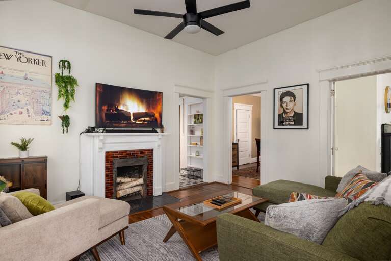 Experience our living room adorned with unique artwork, where creativity meets comfort. Experience our living room adorned with unique artwork, where creativity meets comfort.